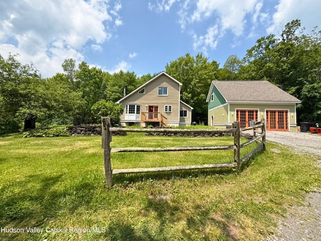 65 Bluebird Ln, Andes, NY 13731 - view of front facade with french doors and gravel driveway