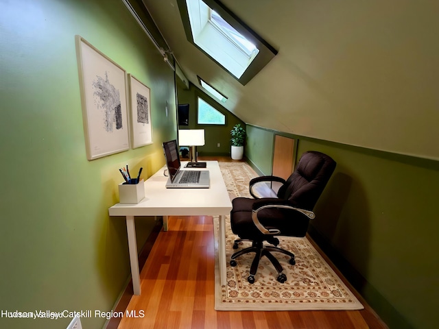 65 Bluebird Ln, Andes, NY 13731 - office space featuring a skylight, lofted ceiling, wood finished floors, and baseboards