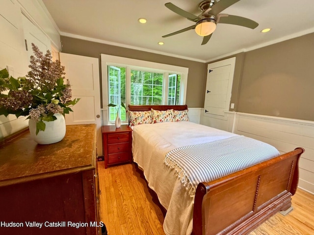 65 Bluebird Ln, Andes, NY 13731 - bedroom with wood finished floors, a wainscoted wall, ornamental molding, recessed lighting, and a ceiling fan