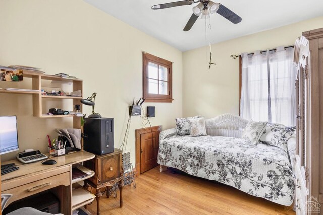 3630 Main St, Stone Ridge, NY 12484 - bedroom with light wood-style floors, a desk, and ceiling fan