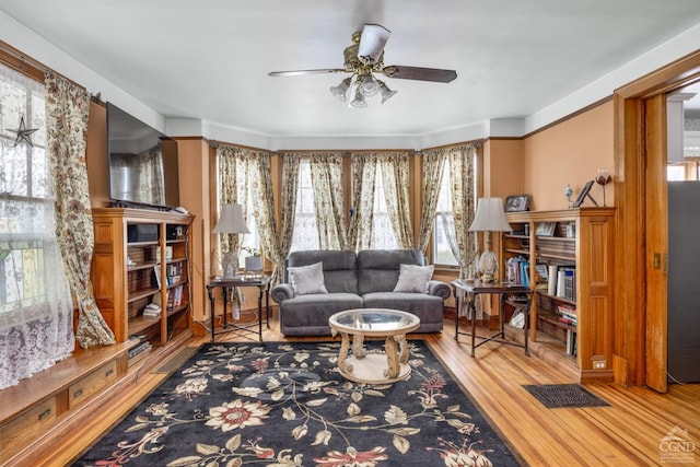 3630 Main St, Stone Ridge, NY 12484 - living area with ceiling fan and wood finished floors