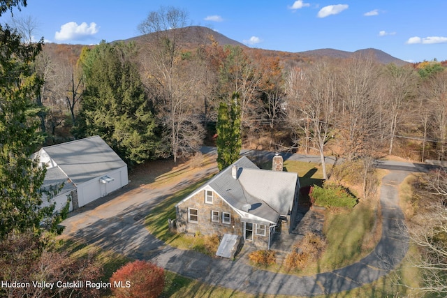 drone / aerial view featuring a mountain view