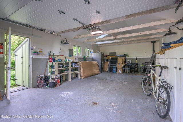 28 Riverview St, Stuyvesant, NY 12173 - garage featuring a garage door opener