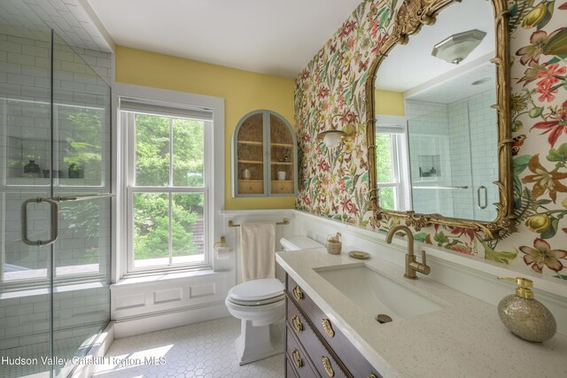 28 Riverview St, Stuyvesant, NY 12173 - full bathroom featuring wallpapered walls, vanity, wainscoting, a shower stall, and tile patterned floors