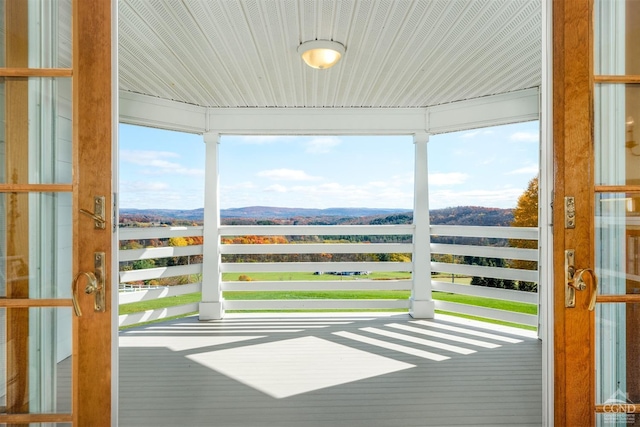 237 Christian Hill Rd, Cooperstown, NY 13326 - unfurnished sunroom featuring a mountain view