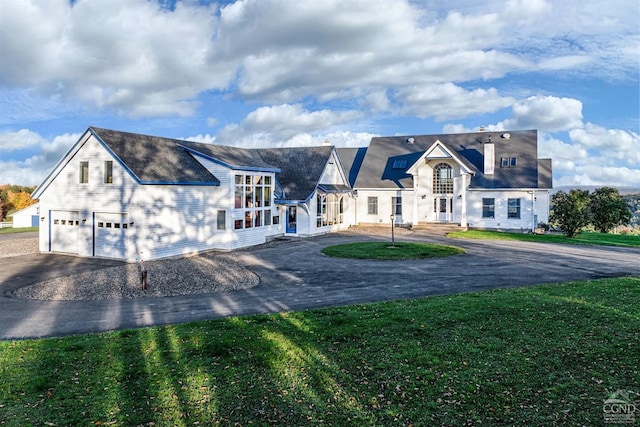 237 Christian Hill Rd, Cooperstown, NY 13326 - view of front of property with asphalt driveway, a garage, and a front yard