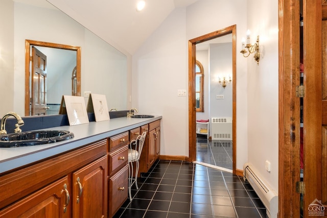 237 Christian Hill Rd, Cooperstown, NY 13326 - bathroom with a baseboard radiator, a sink, radiator, lofted ceiling, and tile patterned flooring