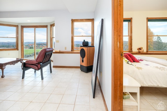 237 Christian Hill Rd, Cooperstown, NY 13326 - bedroom with access to outside, baseboards, and light tile patterned floors