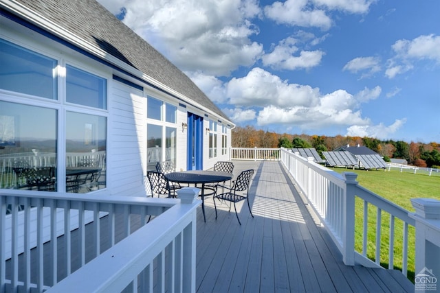 237 Christian Hill Rd, Cooperstown, NY 13326 - wooden terrace featuring outdoor dining space and a lawn