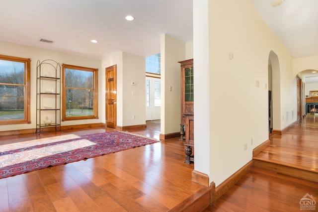 237 Christian Hill Rd, Cooperstown, NY 13326 - foyer entrance with hardwood / wood-style flooring, arched walkways, recessed lighting, and baseboards