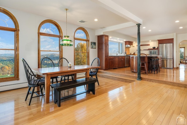 237 Christian Hill Rd, Cooperstown, NY 13326 - dining space featuring plenty of natural light, light wood-style flooring, ornate columns, and recessed lighting
