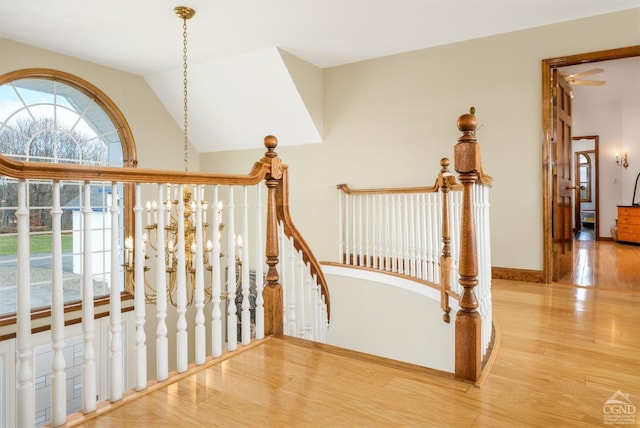 237 Christian Hill Rd, Cooperstown, NY 13326 - stairs with wood finished floors, baseboards, and lofted ceiling