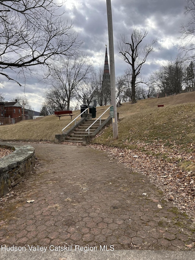 view of road featuring stairs