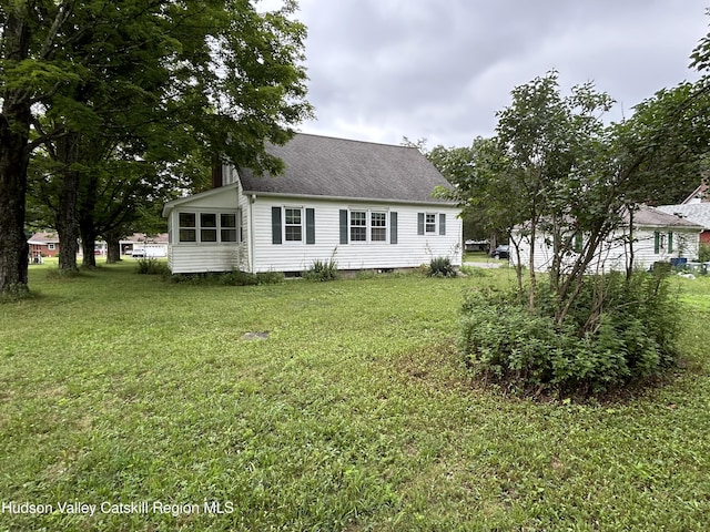 969 Blue Mountain Rd, Saugerties, NY 12477 - rear view of house featuring a shingled roof, a yard, and crawl space