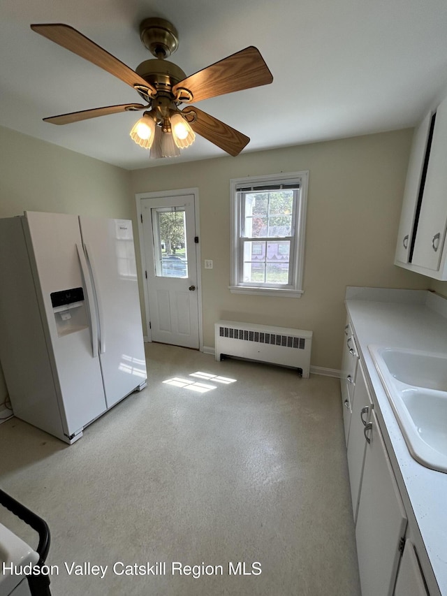969 Blue Mountain Rd, Saugerties, NY 12477 - washroom with radiator, light carpet, and a ceiling fan