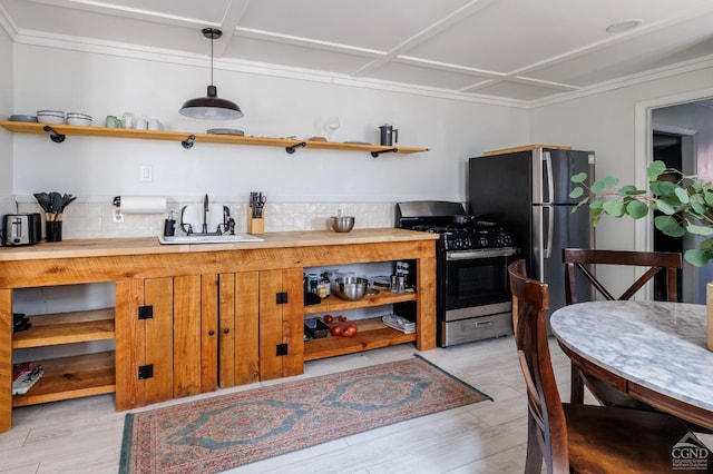 550-552 Columbia St, Hudson, NY 12534 - kitchen featuring open shelves, stainless steel appliances, a sink, and light wood-style floors
