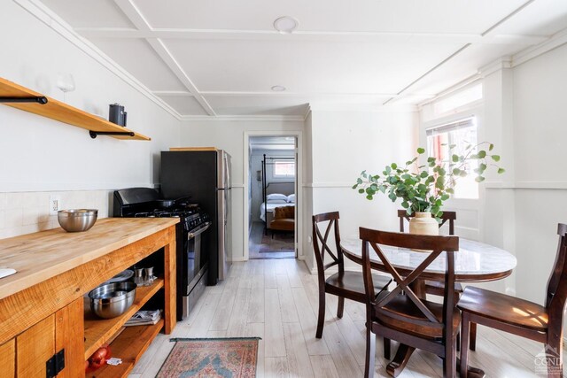 550-552 Columbia St, Hudson, NY 12534 - kitchen featuring gas range, open shelves, butcher block counters, and healthy amount of natural light