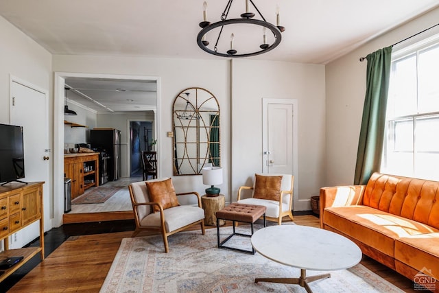 550-552 Columbia St, Hudson, NY 12534 - living room with wood finished floors and a chandelier