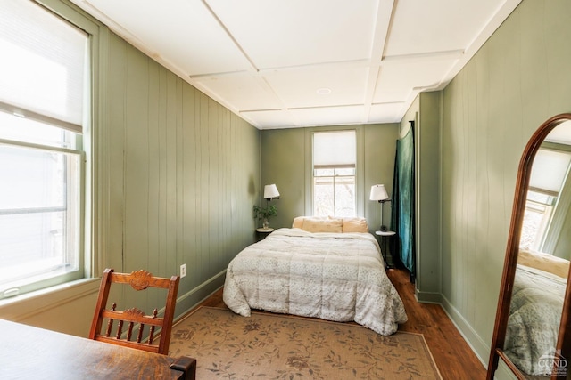 550-552 Columbia St, Hudson, NY 12534 - bedroom featuring wood finished floors, baseboards, wood walls, and coffered ceiling