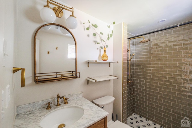 550-552 Columbia St, Hudson, NY 12534 - full bathroom featuring a tile shower, vanity, and toilet