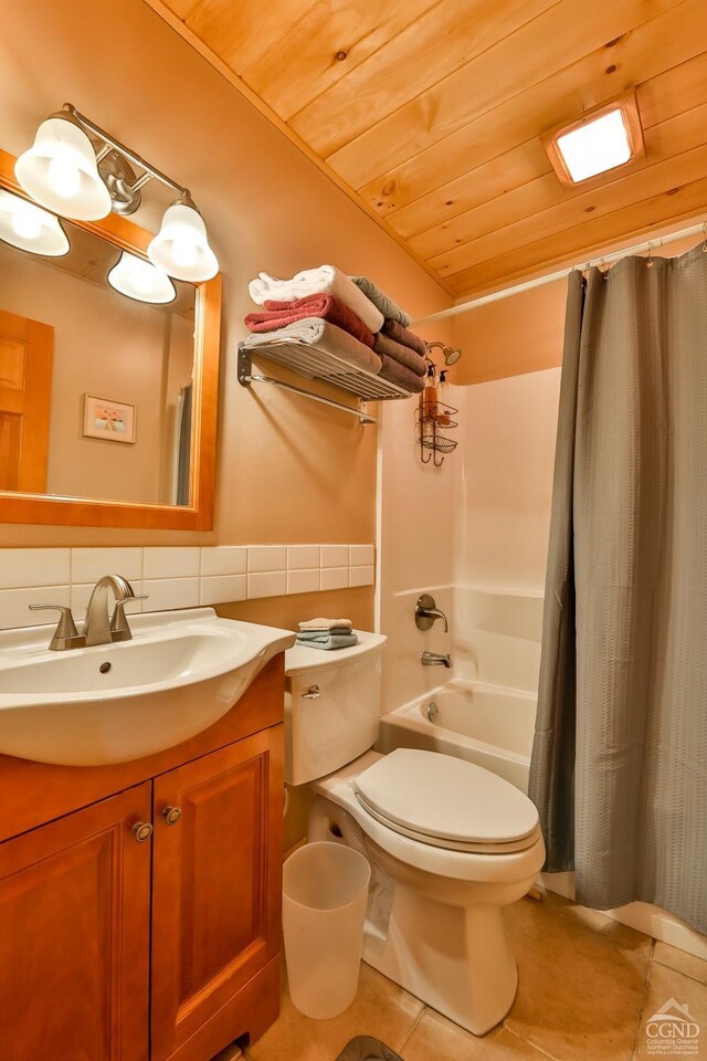 92 Highlands Ln Unit A8, Hunter, NY 12442 - bathroom featuring tile patterned flooring, vanity, toilet, shower / bathtub combination with curtain, and wood ceiling