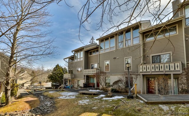 92 Highlands Ln Unit A8, Hunter, NY 12442 - back of house featuring a balcony