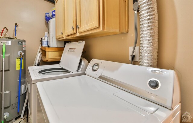 92 Highlands Ln Unit A8, Hunter, NY 12442 - laundry room with washer and dryer, electric water heater, and cabinet space