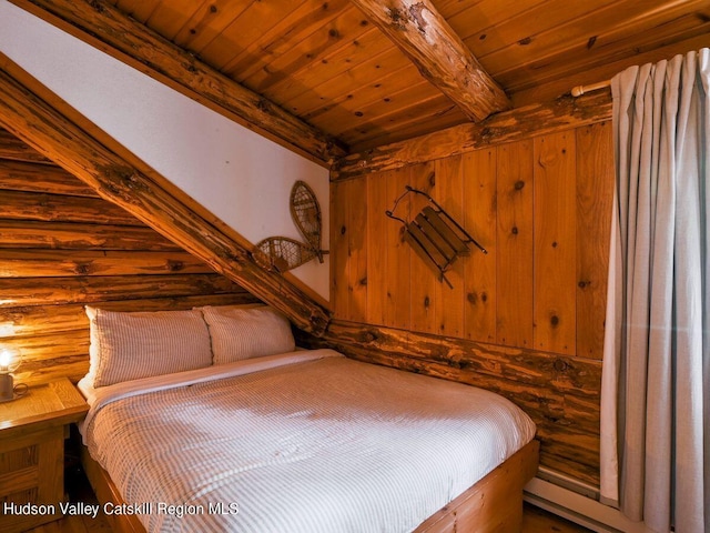 unfurnished bedroom with beam ceiling, wood ceiling, and rustic walls