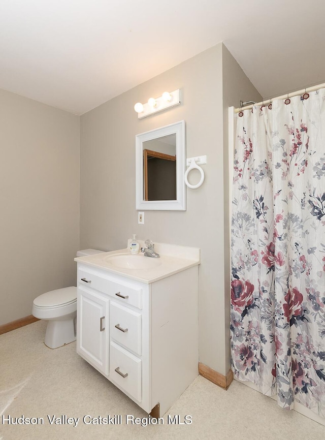 186 Meadow Brook Ln, Greenville, NY 12083 - full bathroom with vanity, curtained shower, toilet, and baseboards