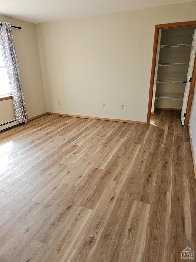 186 Meadow Brook Ln, Greenville, NY 12083 - empty room with wood finished floors and baseboards
