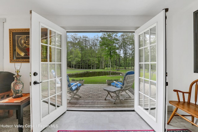 465 High Point Mountain Rd, West Shokan, NY 12494 - doorway to outside featuring french doors, a water view, and view of wooded area