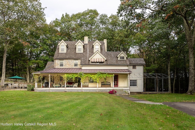 465 High Point Mountain Rd, West Shokan, NY 12494 - view of front facade with a porch, a standing seam roof, a front yard, a chimney, and metal roof