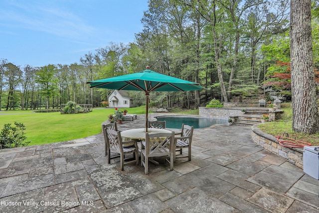 465 High Point Mountain Rd, West Shokan, NY 12494 - view of patio featuring an outbuilding, outdoor dining area, and an outdoor pool
