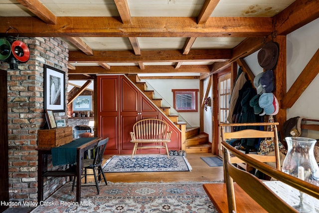 465 High Point Mountain Rd, West Shokan, NY 12494 - sitting room with light wood-style flooring, beam ceiling, stairway, and plenty of natural light