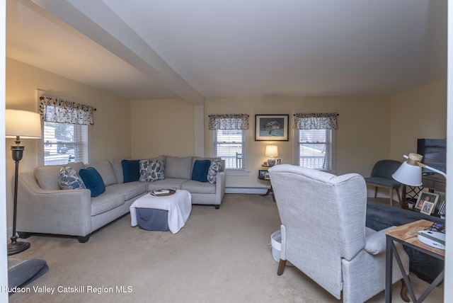 carpeted living room featuring baseboard heating and beamed ceiling