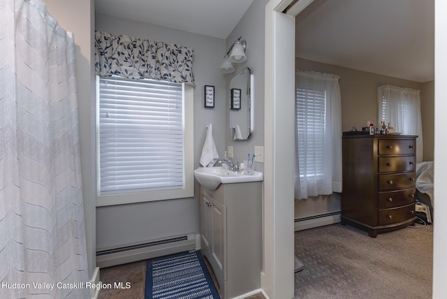 bathroom featuring vanity and a baseboard radiator