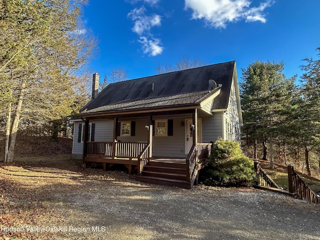 view of front of property featuring covered porch