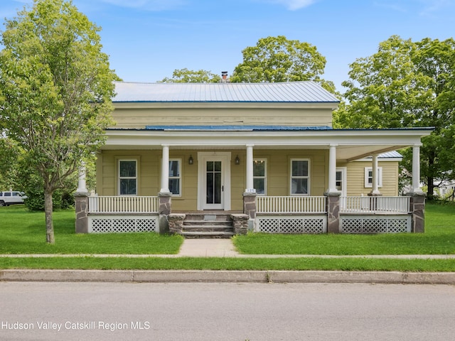 125 Water St, Franklin, NY 13775 - view of front of property with covered porch, metal roof, and a front yard
