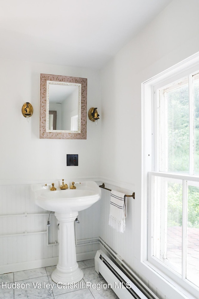 10 Erickson Rd, Hardenburgh, NY 12406 - bathroom with baseboard heating and a wainscoted wall