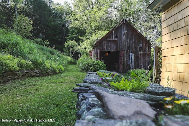 10 Erickson Rd, Hardenburgh, NY 12406 - view of grassy yard featuring an outdoor structure
