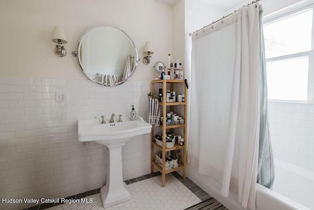 15 Mckinstry Pl, Hudson, NY 12534 - full bathroom with tile walls, shower / tub combo, and tile patterned floors