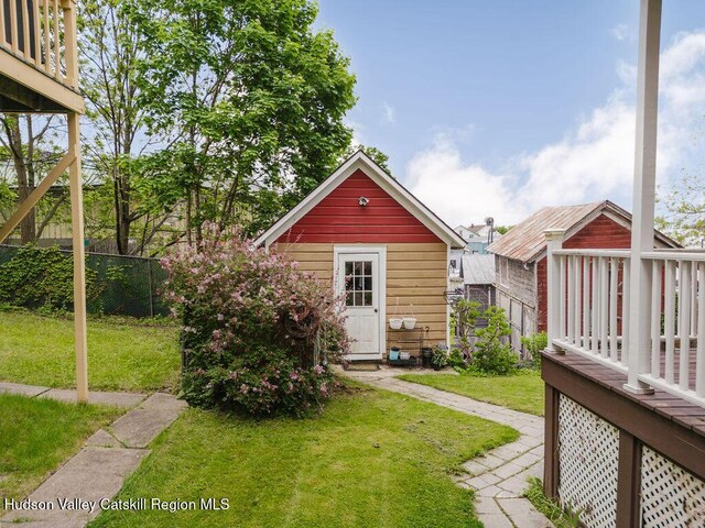 15 Mckinstry Pl, Hudson, NY 12534 - back of property featuring a deck and an outdoor structure