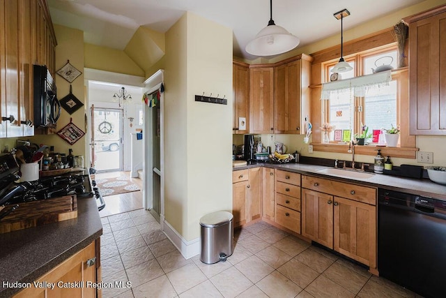 15 Mckinstry Pl, Hudson, NY 12534 - kitchen with black appliances, a sink, pendant lighting, dark countertops, and brown cabinets