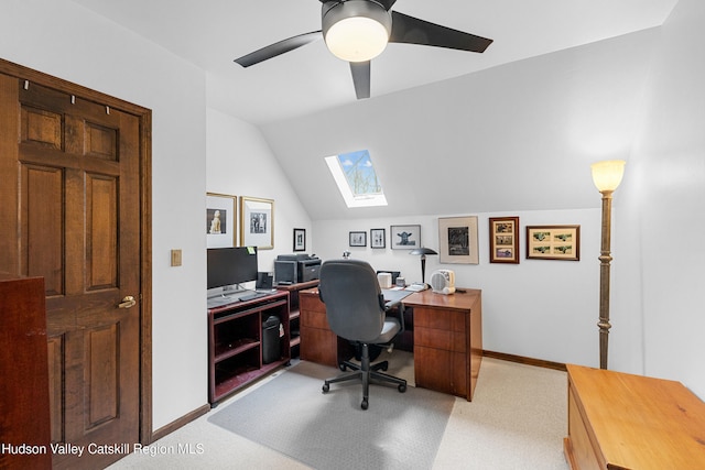 4 Mountain View Dr, Kerhonkson, NY 12446 - office area featuring a skylight, vaulted ceiling, light colored carpet, baseboards, and a ceiling fan