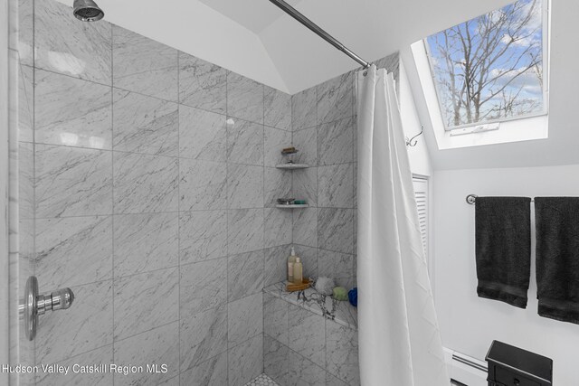 4 Mountain View Dr, Kerhonkson, NY 12446 - full bath featuring tiled shower, baseboard heating, and a skylight