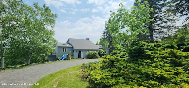490 Mill St, Windham, NY 12496 - view of front of house with driveway and a chimney