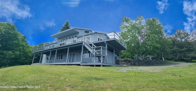 490 Mill St, Windham, NY 12496 - view of front of house featuring a front lawn and a deck