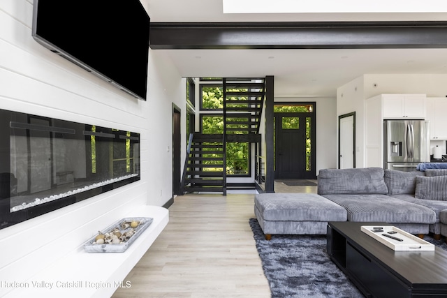 4 Goff Rd, Windham, NY 12496 - living area featuring light wood-style flooring and stairway
