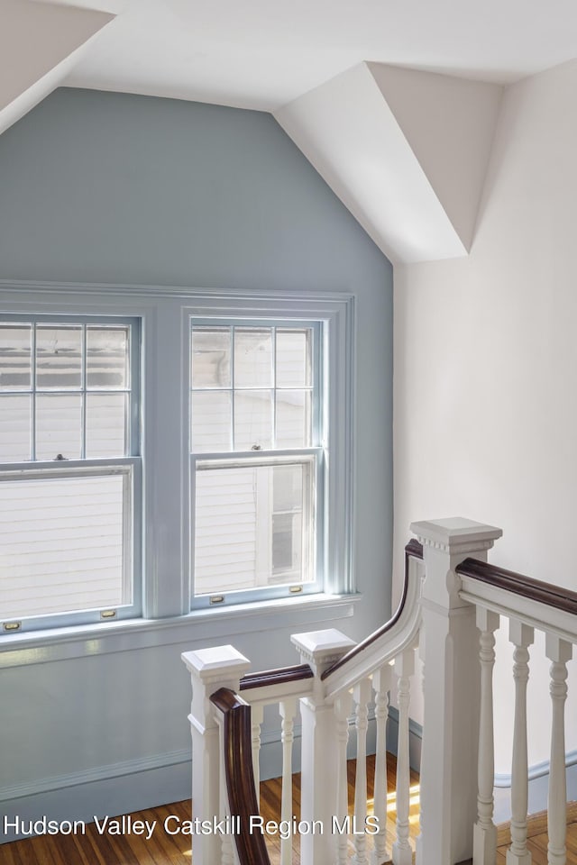 131 William St, Catskill, NY 12414 - staircase featuring vaulted ceiling and wood finished floors