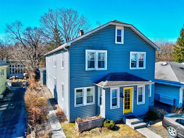 825 Union St, Hudson, NY 12534 - view of front of home featuring a chimney